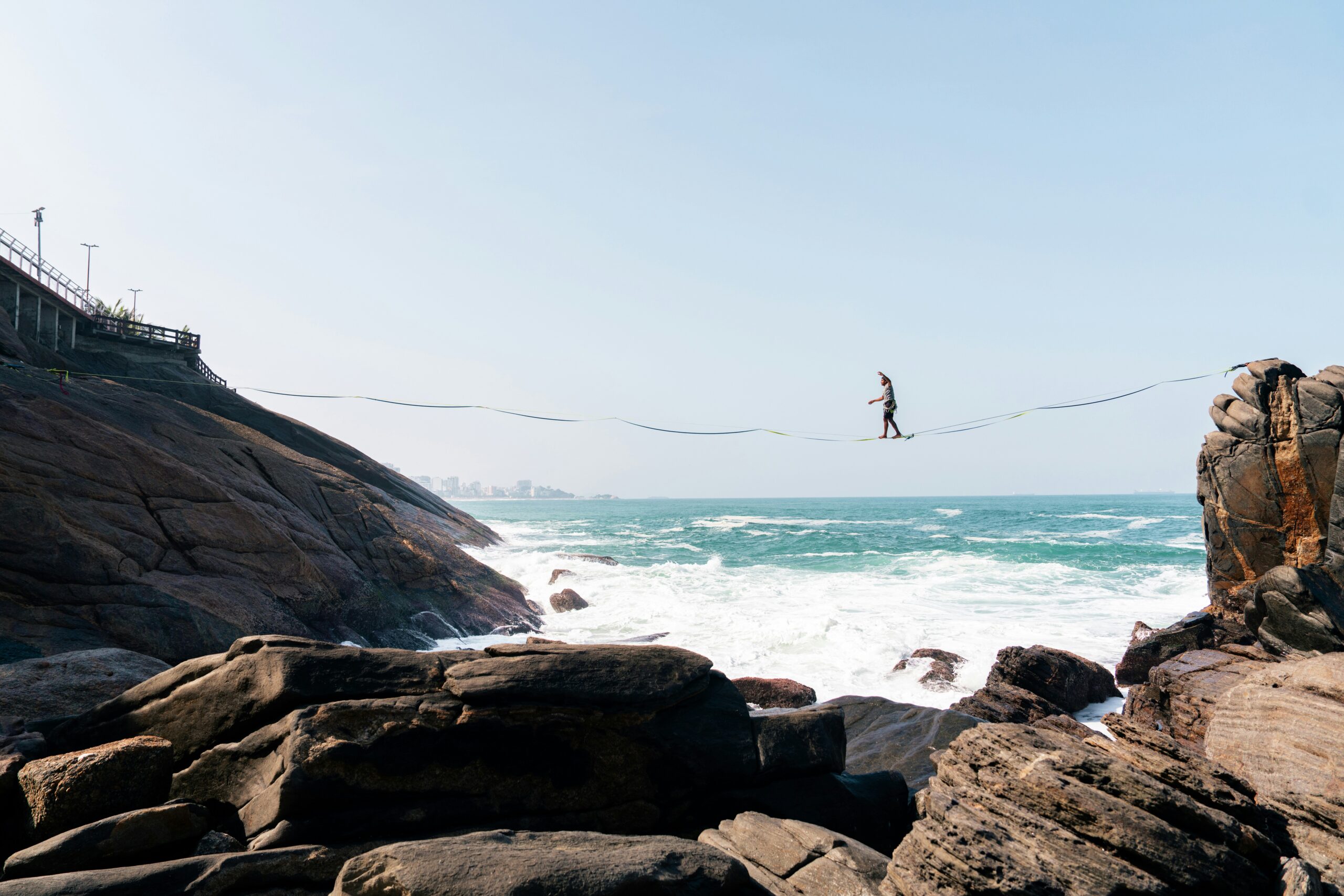 Person walking tightrope, leverage, wealth-building