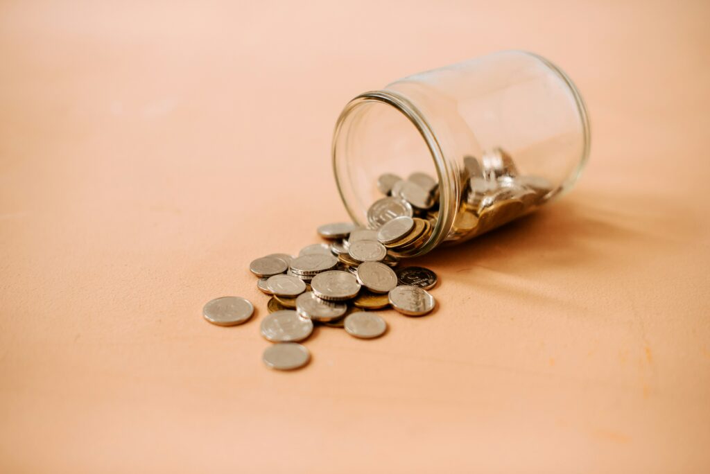 Emerging software offers AI productivity assistance at a budget friendly price. Photo of jar with coins.